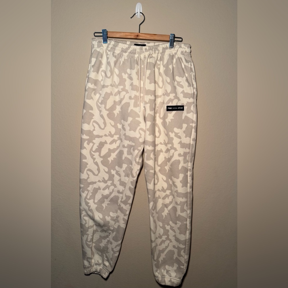Women’s medium pink soda sport white/grey camouflage sweat pants
